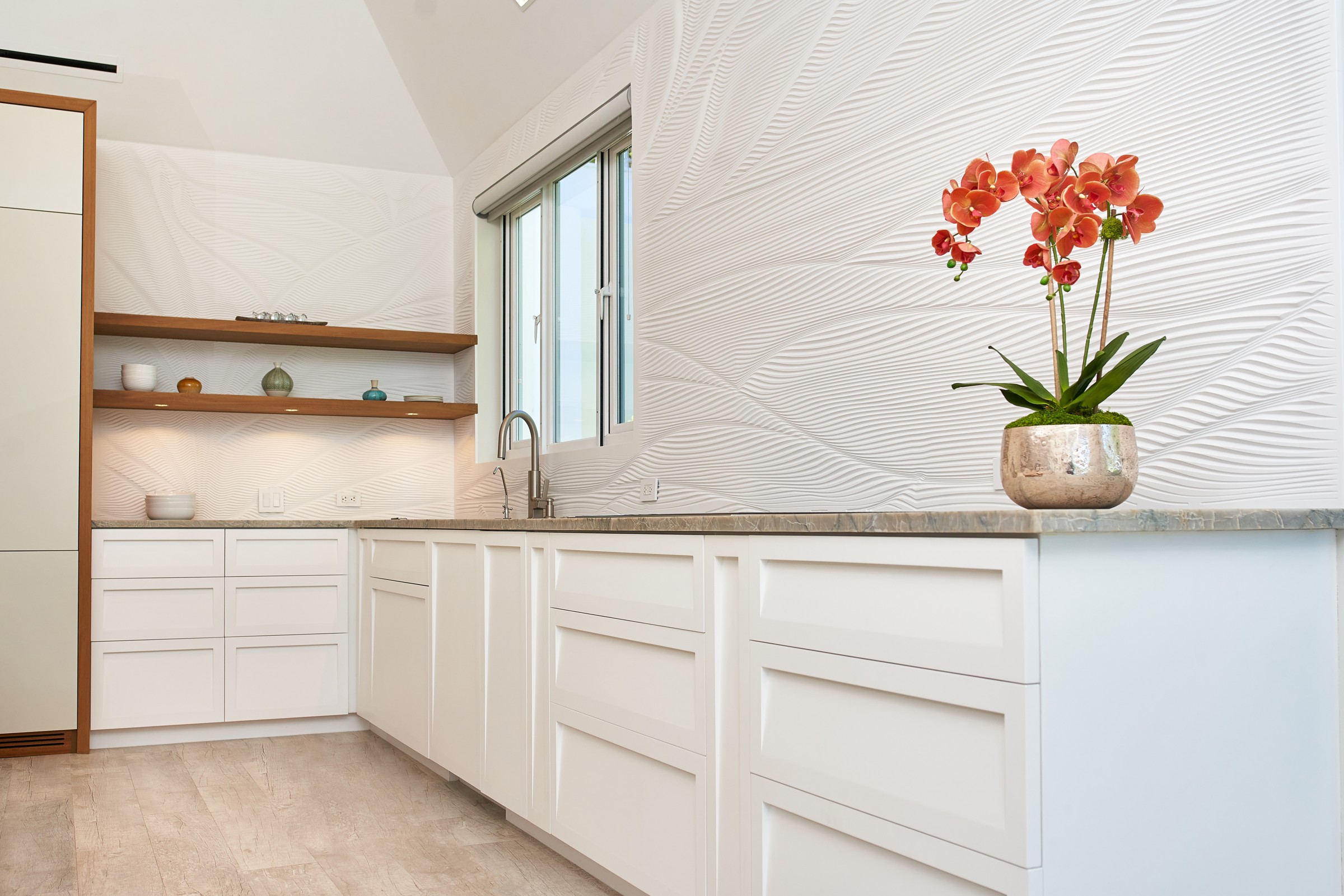 Custom Corian kitchen backsplash at Marbella Shores
